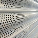 The Innovative Design of Perforated Roller Shutters: Balancing Light and Privacy